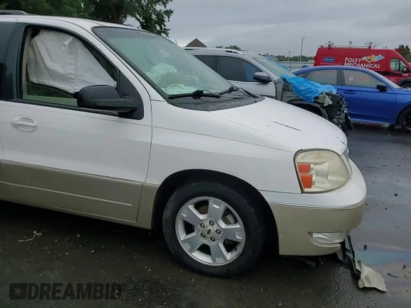 2004 Ford Freestar Limited с VIN 2FMDA58214BA91524, выставлен на аукционе Copart как лот 72140544 с пробегом Не указан миль и Списание • Salvage title. История ставок и продаж доступна на DreamBid. Изображение 12.