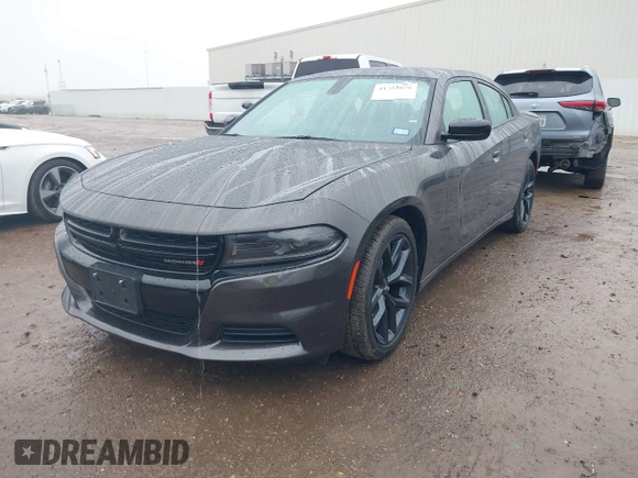 2023 Dodge Charger SXT with VIN 2C3CDXBG8PH566020, listed as a IAAI auction lot 41433879 with 22,187 mi miles and . Bid and sale history available at DreamBid. Image 2.