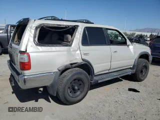 1999 Toyota 4Runner SR5 with VIN JT3GN86R4X0099618, listed as a Copart auction lot 58204145 with 297,759 mi miles and Salvage title. Bid and sale history available at DreamBid. Image 3.