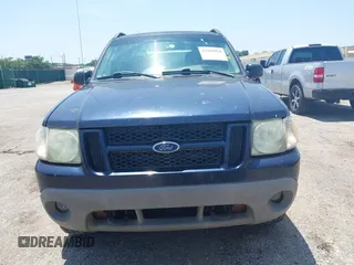 2003 Ford Explorer Sport Trac XLS z VIN 1FMZU77E53UB66531, wystawiony jako IAAI lot #42509028 z przebiegiem 199 323 mil mil oraz . Historia ofert i sprzedaży dostępna na DreamBid. Obrazek 6.