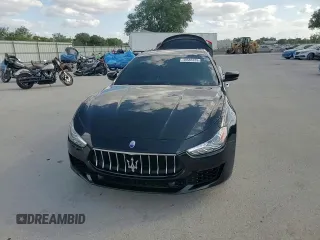 2019 Maserati Ghibli с VIN ZAM57XSA3K1311169, выставлен на аукционе Copart как лот 49583325 с пробегом 66 290 миль миль и Списание • Salvage title. История ставок и продаж доступна на DreamBid. Изображение 13.