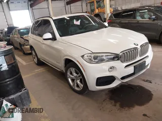 2015 BMW X5 xDrive50i z VIN 5UXKR6C56F0J76986, wystawiony jako IAAI lot #42079106 z przebiegiem 96 220 mil mil oraz . Historia ofert i sprzedaży dostępna na DreamBid. Obrazek 1.