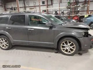 2014 Dodge Journey Limited with VIN 3C4PDDDG9ET204338, listed as a IAAI auction lot 41676032 with 223,129 mi miles. Bid and sale history available at carsss.com. Image 13.