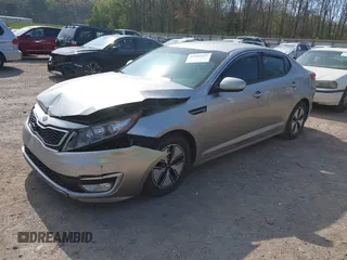 2012 Kia Optima Hybrid with VIN KNAGM4AD9C5020070, listed as a IAAI auction lot 41952137 with 153,942 mi miles. Bid and sale history available at carsss.com. Image 2.