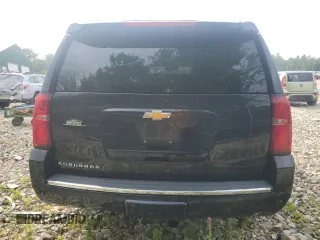 2015 Chevrolet Suburban LTZ with VIN 1GNSKKKC8FR199218, listed as a Copart auction lot 64147184 with 181,676 mi miles and Salvage Title. Bid and sale history available at DreamBid. Image 6.
