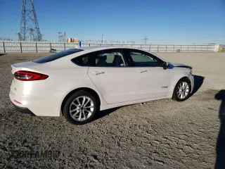 2019 Ford Fusion Hybrid SE with VIN 3FA6P0LU6KR201009, listed as a Copart auction lot 38296513 with 85,028 mi miles. Bid and sale history available at carsss.com. Image 3.