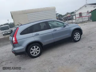 2009 Honda CR-V EX-L with VIN JHLRE387X9C006124, listed as a IAAI auction lot 41757092 with 142,038 mi miles. Bid and sale history available at carsss.com. Image 4.