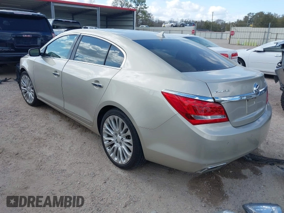 2014 Buick LaCrosse Premium II with VIN 1G4GF5G32EF129559, listed as a IAAI auction lot 41780260 with 120,487 mi miles and . Bid and sale history available at DreamBid. Image 3.