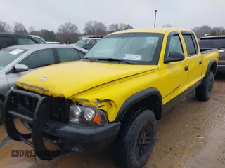 2004 Dodge Dakota Sport z VIN 1D7HG38N64S752270, wystawiony jako IAAI lot #41555599 z przebiegiem 121 283 mil mil oraz . Historia ofert i sprzedaży dostępna na DreamBid. Obrazek 2.
