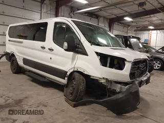 2019 Ford Transit Passenger XL with VIN 1FBZX2YM7KKA22871, listed as a IAAI auction lot 41721561 with 112,189 mi miles. Bid and sale history available at carsss.com. Image 1.