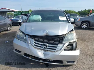 2010 Honda Odyssey EX-L with VIN 5FNRL3H78AB034756, listed as a IAAI auction lot 41979532 with 167,791 mi miles and . Bid and sale history available at DreamBid. Image 12.