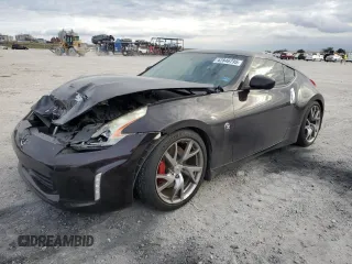 2014 Nissan 370Z Nismo with VIN JN1AZ4EH3EM633305, listed as a Copart auction lot 42846795 with 45,430 mi miles and Salvage Title. Bid and sale history available at DreamBid. Image 1.