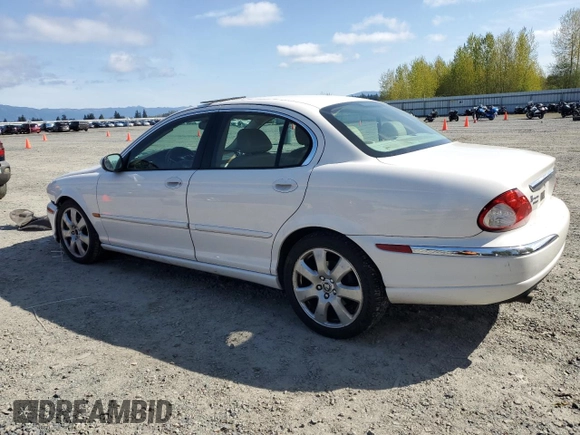 2006 Jaguar X-Type with VIN SAJWA51A06WE68591, listed as a Copart auction lot 53020355 with 179,379 mi miles and Salvage Title. Bid and sale history available at DreamBid. Image 2.
