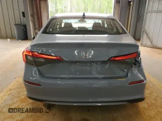 2024 Honda Civic EX z VIN 2HGFE1F78RH331974, wystawiony jako Copart lot #52220315 z przebiegiem 9 331 mil mil oraz Szkoda całkowita • Salvage title. Historia ofert i sprzedaży dostępna na DreamBid. Obrazek 6.