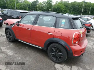 2015 MINI Countryman S with VIN WMWZC5C54FWP42858, listed as a Copart auction lot 60684185 with 83,163 mi miles and Salvage title. Bid and sale history available at DreamBid. Image 2.