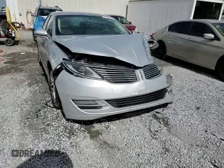 2014 Lincoln MKZ z VIN 3LN6L2G91ER831043, wystawiony jako Copart lot #63109715 z przebiegiem Nie podano mil oraz Szkoda całkowita • Salvage title. Historia ofert i sprzedaży dostępna na DreamBid. Obrazek 14.