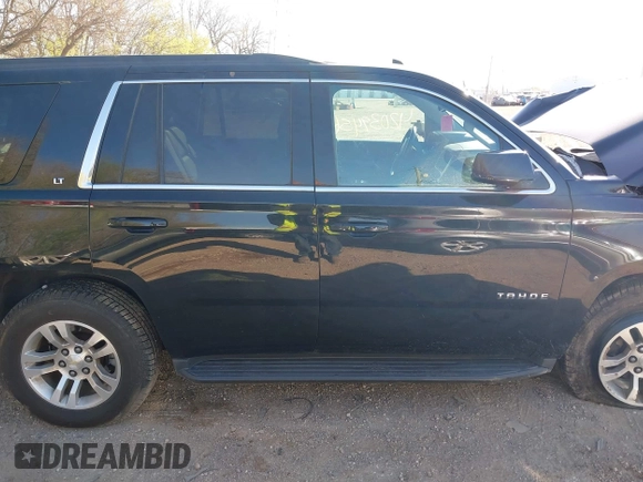 2016 Chevrolet Tahoe LT with VIN 1GNSKBKCXGR393105, listed as a IAAI auction lot 42039456 with 94,417 mi miles and . Bid and sale history available at DreamBid. Image 13.