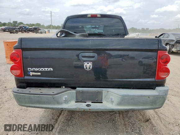 2005 Dodge Dakota ST z VIN 1D7HE28K35S235225, wystawiony jako Copart lot #57684725 z przebiegiem 184 546 mil mil oraz Szkoda całkowita • Salvage title. Historia ofert i sprzedaży dostępna na DreamBid. Obrazek 6.