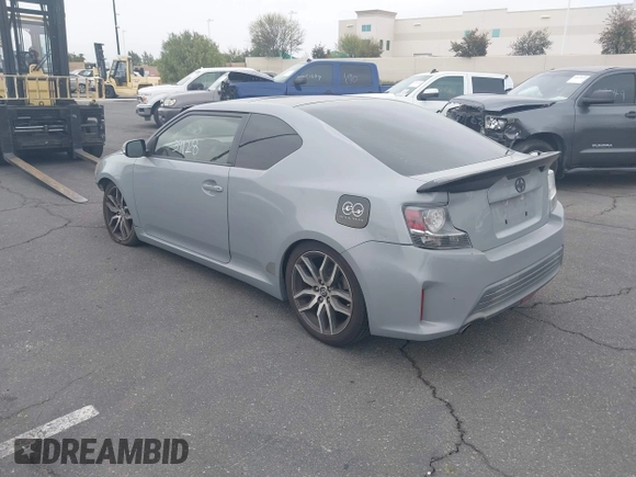 2014 Scion tC with VIN JTKJF5C71E3077886, listed as a IAAI auction lot 41939128 with 138,845 mi miles. Bid and sale history available at carsss.com. Image 3.