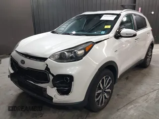 2019 Kia Sportage EX with VIN KNDPNCACXK7571757, listed as a IAAI auction lot 41919955 with 80,895 mi miles. Bid and sale history available at carsss.com. Image 2.