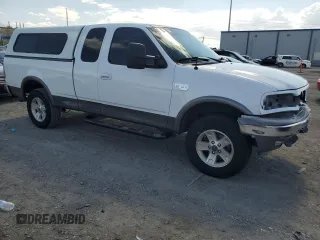 2002 Ford F-150 XL z VIN 1FTRX18L42NB40419, wystawiony jako Copart lot #60486205 z przebiegiem 241 853 mil mil oraz Szkoda całkowita • Salvage title. Historia ofert i sprzedaży dostępna na DreamBid. Obrazek 4.
