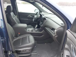 2023 Chevrolet Traverse LT z VIN 1GNEVHKW0PJ120044, wystawiony jako IAAI lot #42002348 z przebiegiem 48 795 mil mil oraz . Historia ofert i sprzedaży dostępna na DreamBid. Obrazek 5.