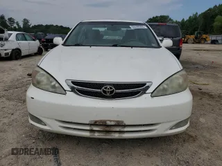 2004 Toyota Camry LE z VIN JTDBE32K440281087, wystawiony jako Copart lot #60486995 z przebiegiem 229 856 mil mil oraz Czysty tytuł • Clean title. Historia ofert i sprzedaży dostępna na DreamBid. Obrazek 6.