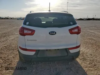 2012 Kia Sportage LX z VIN KNDPBCA22C7261796, wystawiony jako Copart lot #57284425 z przebiegiem 133 383 mil mil oraz Szkoda całkowita • Salvage title. Historia ofert i sprzedaży dostępna na DreamBid. Obrazek 6.