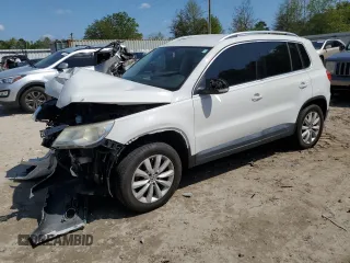 2011 Volkswagen Tiguan SEL w/Premium Navi z VIN WVGAV7AXXBW532717, wystawiony jako Copart lot #51328085 z przebiegiem Nie podano mil oraz Szkoda całkowita • Salvage title. Historia ofert i sprzedaży dostępna na DreamBid. Obrazek 1.