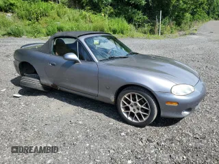 2002 Mazda MX-5 Miata Cloth z VIN JM1NB353520224582, wystawiony jako Copart lot #63669835 z przebiegiem 88 455 mil mil oraz Szkoda całkowita • Salvage title. Historia ofert i sprzedaży dostępna na DreamBid. Obrazek 4.