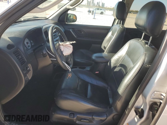 2004 Ford Escape Limited with VIN 1FMCU041X4KA45604, listed as a Copart auction lot 80974334 with 88,687 mi miles and Salvage title. Bid and sale history available at DreamBid. Image 7.
