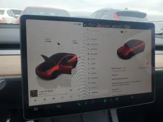 2023 Tesla Model Y Performance with VIN 7SAYGDEF4PF960357, listed as a Copart auction lot 51126105 with 37,252 mi miles and Salvage Title. Bid and sale history available at DreamBid. Image 9.