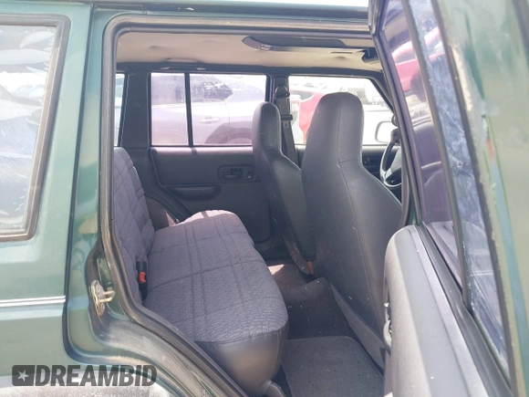 1999 Jeep Cherokee SE with VIN 1J4FT28S2XL669523, listed as a IAAI auction lot 42429202 with 83,250 mi miles and . Bid and sale history available at DreamBid. Image 8.