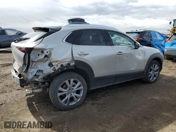 2022 Mazda CX-30 S Premium with VIN 3MVDMBDL4NM447276, listed as a Copart auction lot 47527985 with 4,577 mi miles and Salvage Title. Bid and sale history available at carsss.com. Image 3.