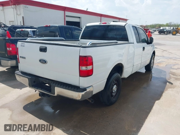 2005 Ford F-150 STX with VIN 1FTRX12W85NB75651, listed as a IAAI auction lot 41789580 with 235,133 mi miles. Bid and sale history available at carsss.com. Image 4.