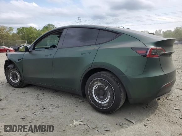 2024 Tesla Model Y Long Range z VIN 7SAYGAEEXRF987104, wystawiony jako Copart lot #54056015 z przebiegiem 24 027 mil mil oraz Szkoda całkowita • Salvage title. Historia ofert i sprzedaży dostępna na DreamBid. Obrazek 2.