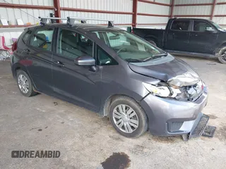 2015 Honda Fit LX with VIN 3HGGK5H51FM708240, listed as a IAAI auction lot 42665552 with 217,962 mi miles and . Bid and sale history available at DreamBid. Image 1.