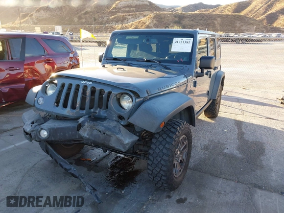 2014 Jeep Wrangler Unlimited Rubicon X with VIN 1C4BJWFG3EL134522, listed as a IAAI auction lot 41221381 with 66,897 mi miles and . Bid and sale history available at DreamBid. Image 17.