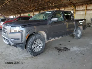 2023 Nissan Frontier SV z VIN 1N6ED1EK0PN665680, wystawiony jako Copart lot #74888104 z przebiegiem 16 479 mil mil oraz Szkoda całkowita • Salvage title. Historia ofert i sprzedaży dostępna na DreamBid. Obrazek 1.