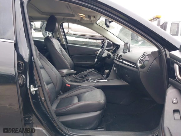 2016 Mazda Mazda3 i Grand Touring with VIN 3MZBM1N75GM267972, listed as a IAAI auction lot 41030060 with 86,065 mi miles. Bid and sale history available at carsss.com. Image 5.