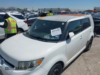 2012 Scion xB z VIN JTLZE4FE1CJ018190, wystawiony jako IAAI lot #41975106 z przebiegiem 117 994 mil mil oraz . Historia ofert i sprzedaży dostępna na DreamBid. Obrazek 6.
