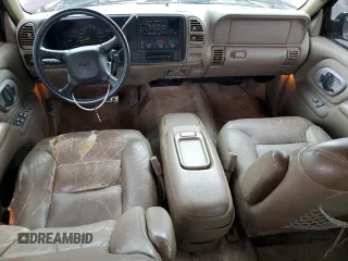 1999 Chevrolet Suburban with VIN 3GNEC16RXXG260623, listed as a Copart auction lot 54609694 with 246,460 mi miles and Salvage Title. Bid and sale history available at carsss.com. Image 8.