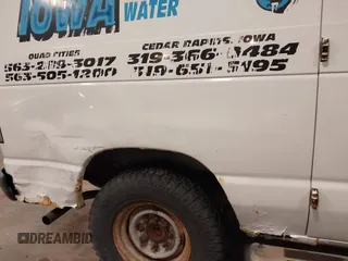 2006 Ford Econoline Cargo with VIN 1FTNE24W56DA13331, listed as a IAAI auction lot 41822424 with 370,496 mi miles and . Bid and sale history available at DreamBid. Image 20.