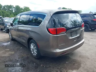 2017 Chrysler Pacifica Touring z VIN 2C4RC1DG2HR833473, wystawiony jako IAAI lot #42597208 z przebiegiem 78 239 mil mil oraz . Historia ofert i sprzedaży dostępna na DreamBid. Obrazek 3.
