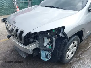 2014 Jeep Cherokee Sport with VIN 1C4PJLAB5EW268916, listed as a IAAI auction lot 41715729 with 116,544 mi miles and . Bid and sale history available at DreamBid. Image 6.