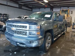2014 Chevrolet Silverado 1500 LTZ with VIN 1GCVKSEJ2EZ312286, listed as a IAAI auction lot 41496345 with 76,747 mi miles and . Bid and sale history available at DreamBid. Image 18.