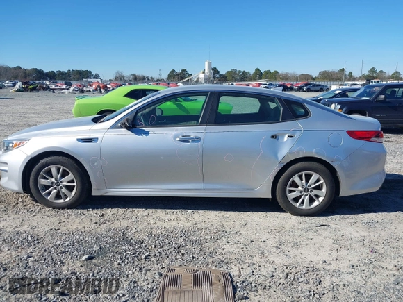 2016 Kia Optima LX with VIN 5XXGT4L37GG015462, listed as a IAAI auction lot 41247091 with 165,755 mi miles and . Bid and sale history available at DreamBid. Image 14.
