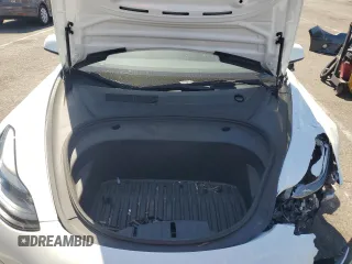 2023 Tesla Model 3 with VIN 5YJ3E1EA8PF394705, listed as a Copart auction lot 52319945 with 58,193 mi miles and Salvage title. Bid and sale history available at DreamBid. Image 11.