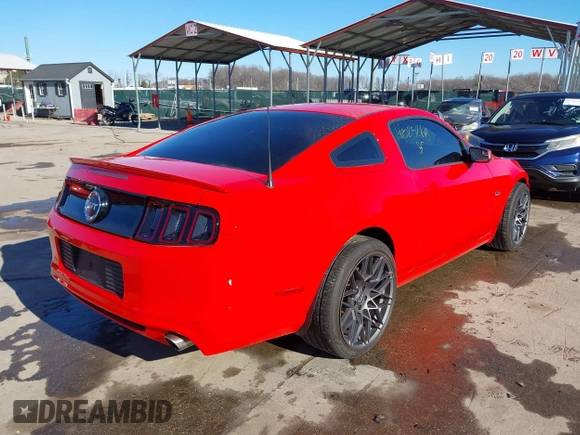 2013 Ford Mustang GT with VIN 1ZVBP8CFXD5215667, listed as a IAAI auction lot 41525268 with 129,561 mi miles and . Bid and sale history available at DreamBid. Image 4.
