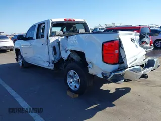 2018 Chevrolet Silverado 1500 LT with VIN 1GCRCREC5JZ270246, listed as a IAAI auction lot 41827903 with 167,968 mi miles and . Bid and sale history available at DreamBid. Image 3.